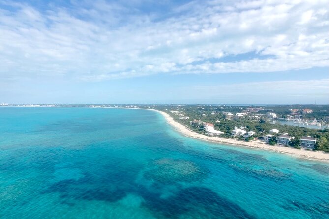 1 Hour Private Parasailing Charter, Grace Bay, Providenciales - Music on Bluetooth, optional dips, and photo reality checks