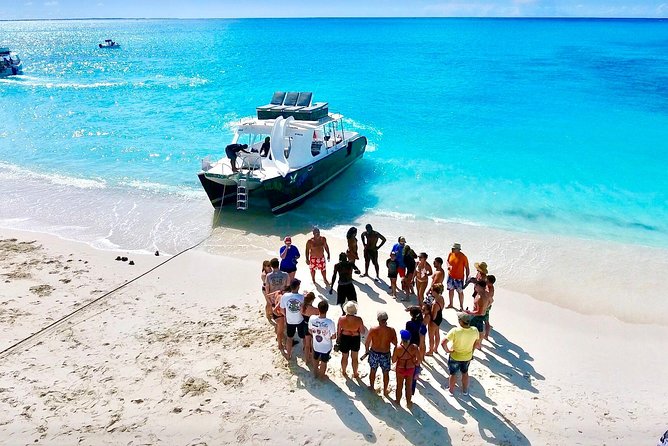4hour Group Half Day Snorkeling Excursion in Grace Bay - Stop 1 at the reef near Providenciales: snorkel basics that actually work