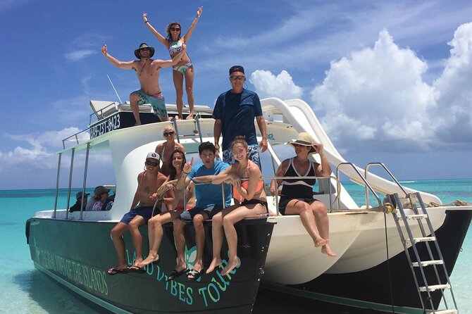 4hour Group Half Day Snorkeling Excursion in Grace Bay - Stop 3 on the return: rooftop jump board and curved water slides