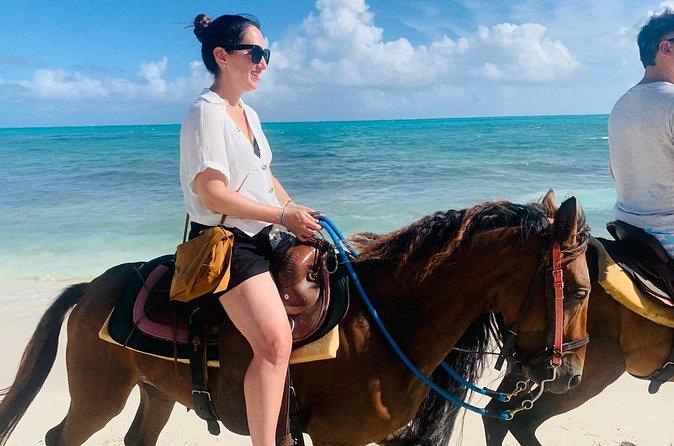 60-Minute Private Horseback Riding Experience in Turks and Caicos - Photos and Bouquet: The Best Extras and One Photo Reality Check