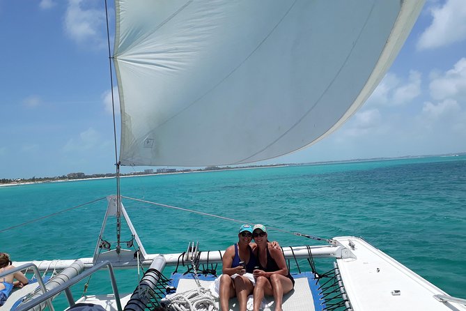 7 Hour Private Catamaran Sail, Snorkel and Beach BBQ Grace Bay, Providenciales - After lunch sailing: more swim time, then sails up toward evening light