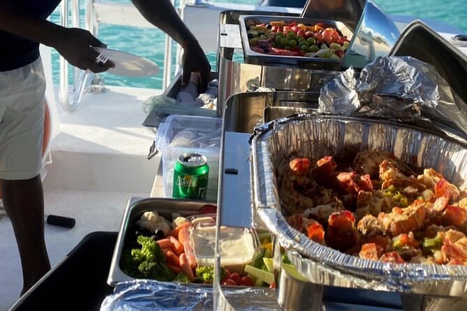 All Day Adventure with a Beach BBQ Feast from Providenciales - Continental Breakfast Cruise Along Grace Bay