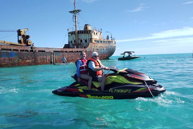 FAMOUS SHIPWRECK, Tiki Bar & Iguana Island Private Jet Ski Tour - Noah’s Ark Beach Club TCI, a floating bar-style break