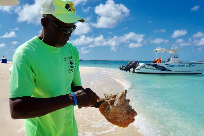 Gibbs Cay Stingray and Conch Dive Adventure - The boat ride stop for live conch, what it teaches you