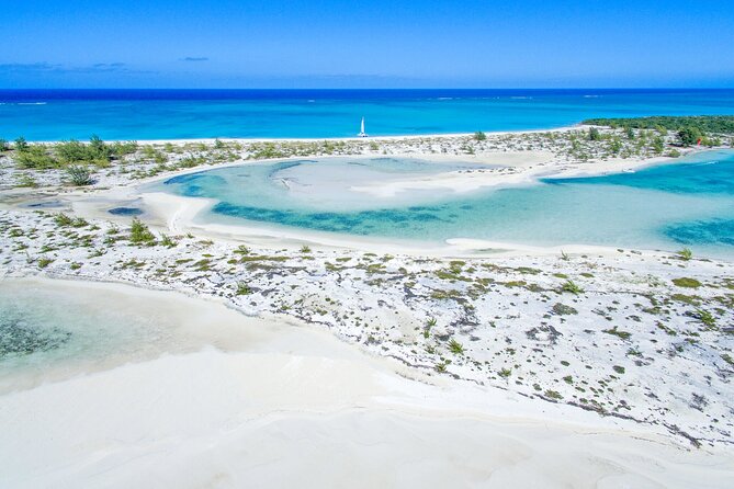 Half Moon Bay Jet Ski Tour & Snorkeling the La Famille Shipwreck - Half Moon Bay: The Beach That Looks Like a Sandbar