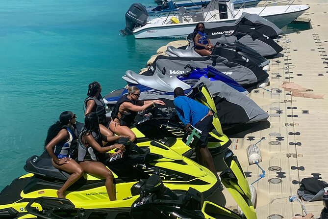 Jet Skiing around La famille ship and smaller pristine cays - Getting to Caribbean Cruisin at the TCI Ferry Area