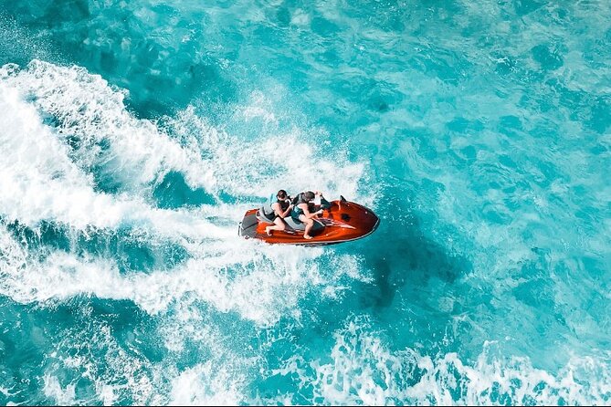 Jet Skiing around La famille ship and smaller pristine cays - The 2-Hour Flow Around Pristine Cays and Boat-Only Beaches