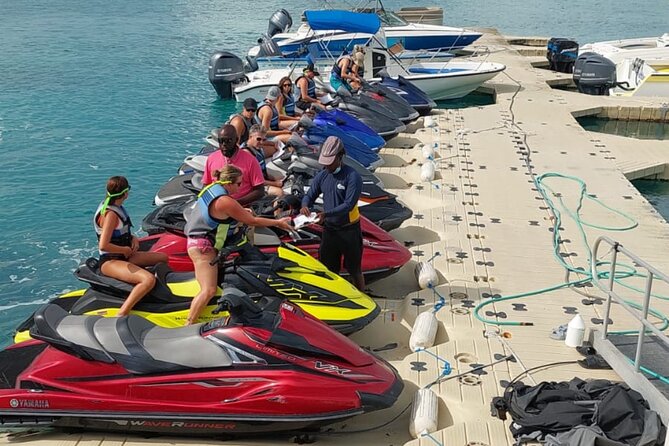 Lunch Seafari to pristine cays, shipwreck and lunch at TIKI BAR - Meeting at Leeward Settlement and getting ready to ride