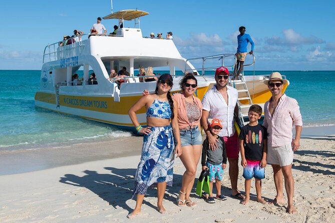 Morning Half Day Cruise from Providenciales with Snorkeling and Iguana Island - Half Moon Bay: snorkeling, beach time, and the slide or jump option