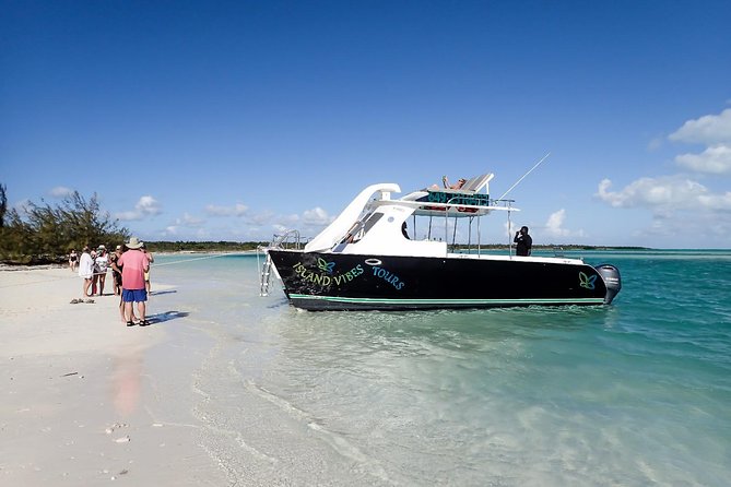 Private 4 Hour Power Catamaran Excursion in Grace Bay - Conch time below the surface: fun, but not as easy as it sounds