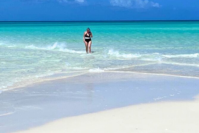 Private Boat Tour with Snorkeling, Island Hopping, and Noahs Ark - Grace Bay Beach snorkeling: short, sweet water time
