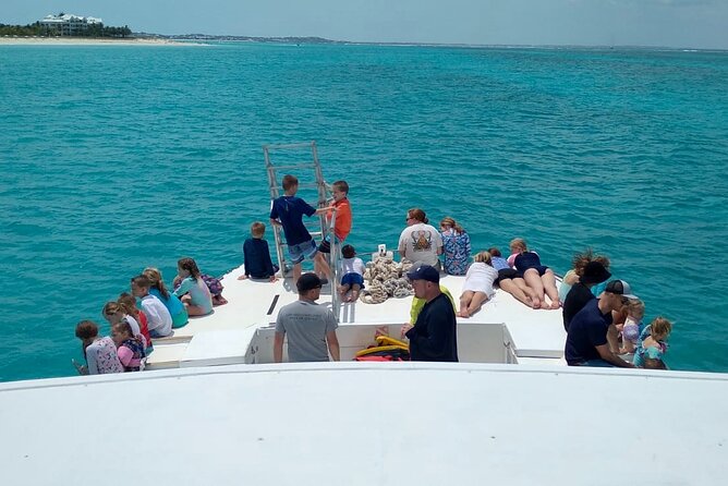 Private Reef, Beach and Sandbar Tour from Providenciales - Grace Bay Beach stop: your first swim and snorkel hour