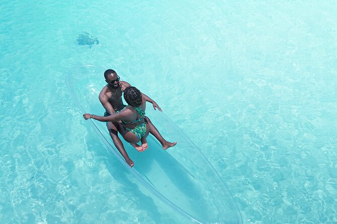 Romantic Clear Kayak Drone Photoshoot for Couples Turks & Caicos - How the photographer and drone create the couples story