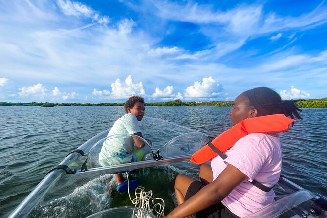 Sip & Sea Mangrove Glass Boat Tour Grand Turk Island - Mangrove ecology and the dredger crane: where nature meets canal history