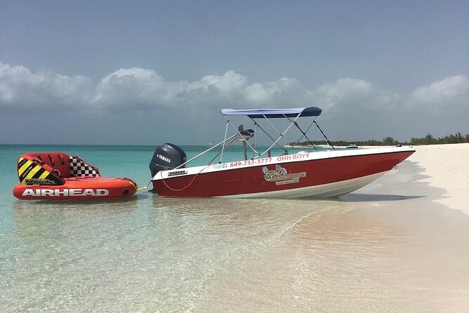 Tubing on grace bay beach Turks and caicos islands - Tube setup and group size: what it feels like with up to four per float