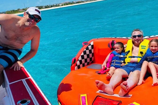 Tubing on grace bay beach Turks and caicos islands - The best add-on here: photos and videos after the ride